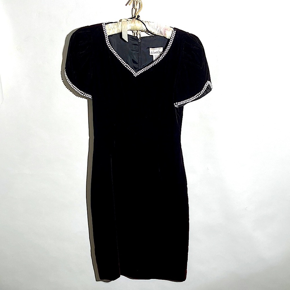 Classic black cocktail dress with pearl accents
